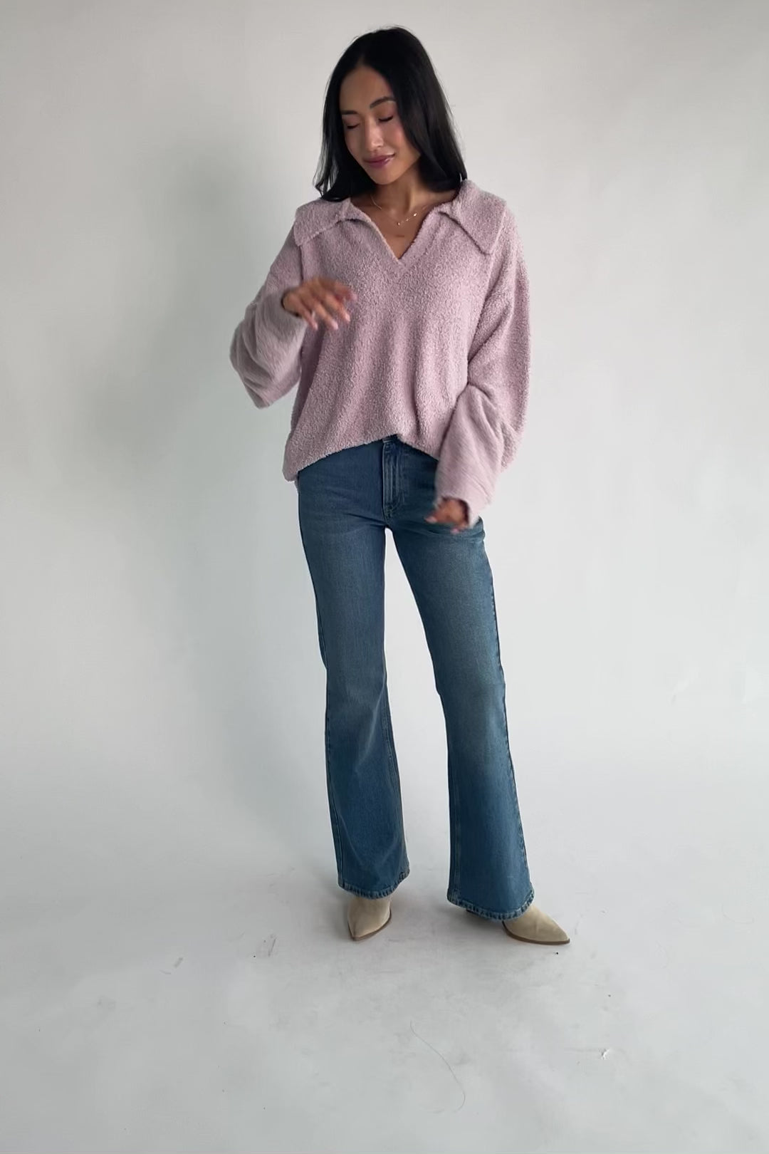 Lockwood Sweater in Dusty Lilac with fuzzy knit texture, collared V-neck, long sleeves, and ribbed cuffs and hem.