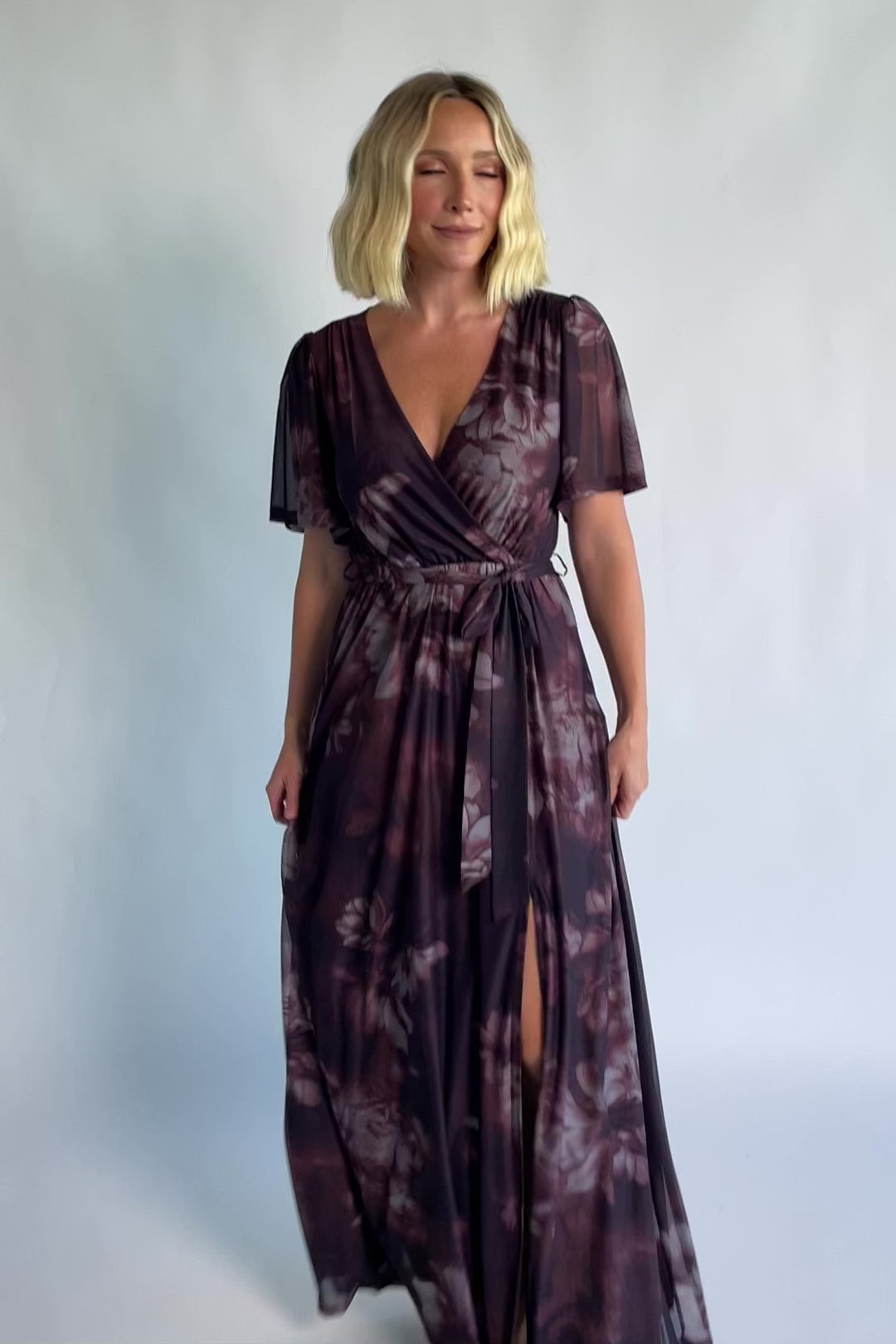 Kristina Mesh Maxi Dress in Dark Clove Floral with crossover neckline, elastic waist, and side slit.