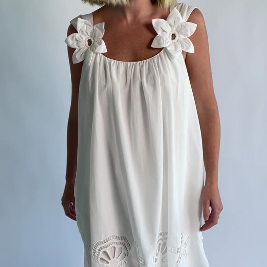 Citrus Short Dress in Off White with scoop neckline, shell and starfish cutouts, and relaxed silhouette.