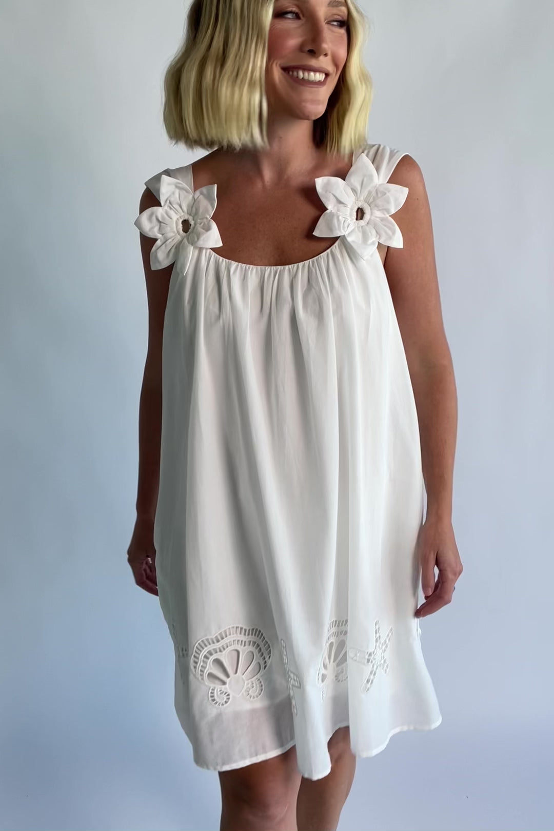 Citrus Short Dress in Off White with scoop neckline, shell and starfish cutouts, and relaxed silhouette.