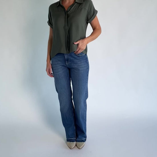 Miriam Top in Dark Sage with collared neckline, concealed button front, cuffed short sleeves, and relaxed silhouette.