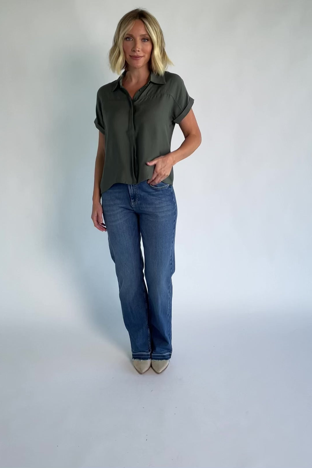 Miriam Top in Dark Sage with collared neckline, concealed button front, cuffed short sleeves, and relaxed silhouette.