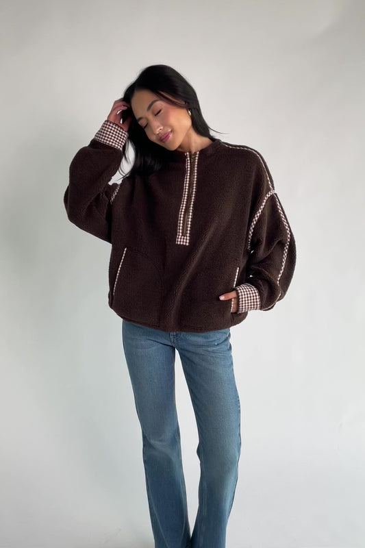 Tylee Fleece Jacket in Chocolate with sherpa fleece, half-zip neckline, brown gingham trim, fold-over cuffs, and side pockets.