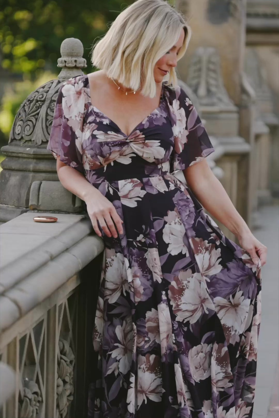 Positano Maxi Dress in Dusty Plum Floral with sweetheart neckline, flutter sleeves, smocked back, and tiered skirt.