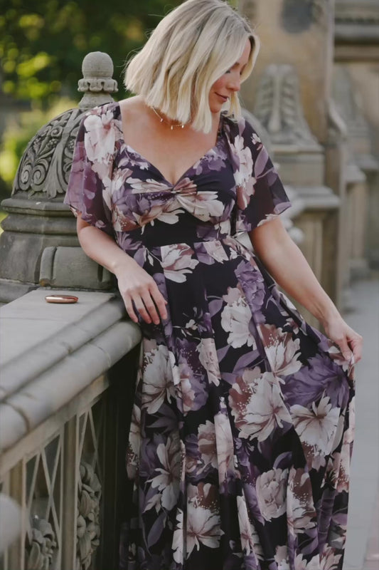 Positano Maxi Dress in Dusty Plum Floral with sweetheart neckline, flutter sleeves, smocked back, and tiered skirt.