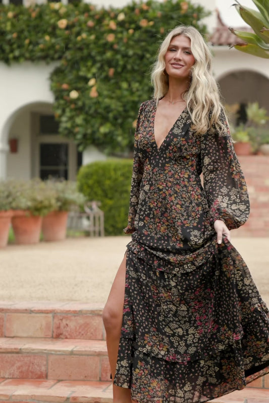Bowman Deep V Tiered Maxi Dress in Black Multi with deep V-neck, long sleeves, ruffle-tiered skirt, and leg slit.