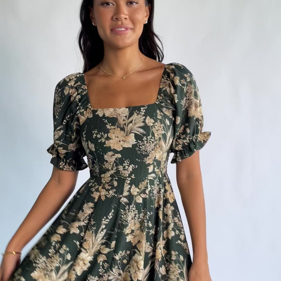Addison Maxi Dress in Green + Natural with a square neckline, puffed ruffle-cuff sleeves, and a tiered ruffle skirt.
