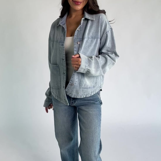 Finn Lightweight Jacket in Vintage Blue with button front, classic collar, front pockets, and shirttail hem.