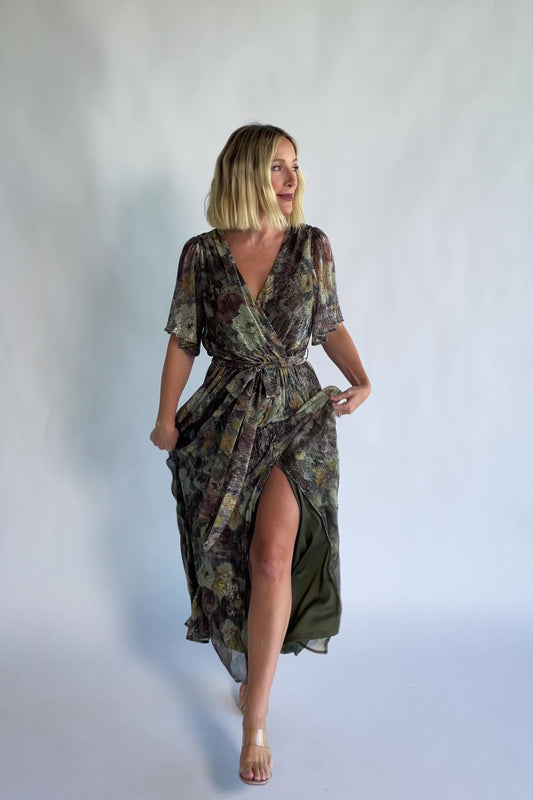 Rachel Maxi Dress in Green Multi with abstract floral details, a faux-wrap neckline, and semi-sheer overlay.