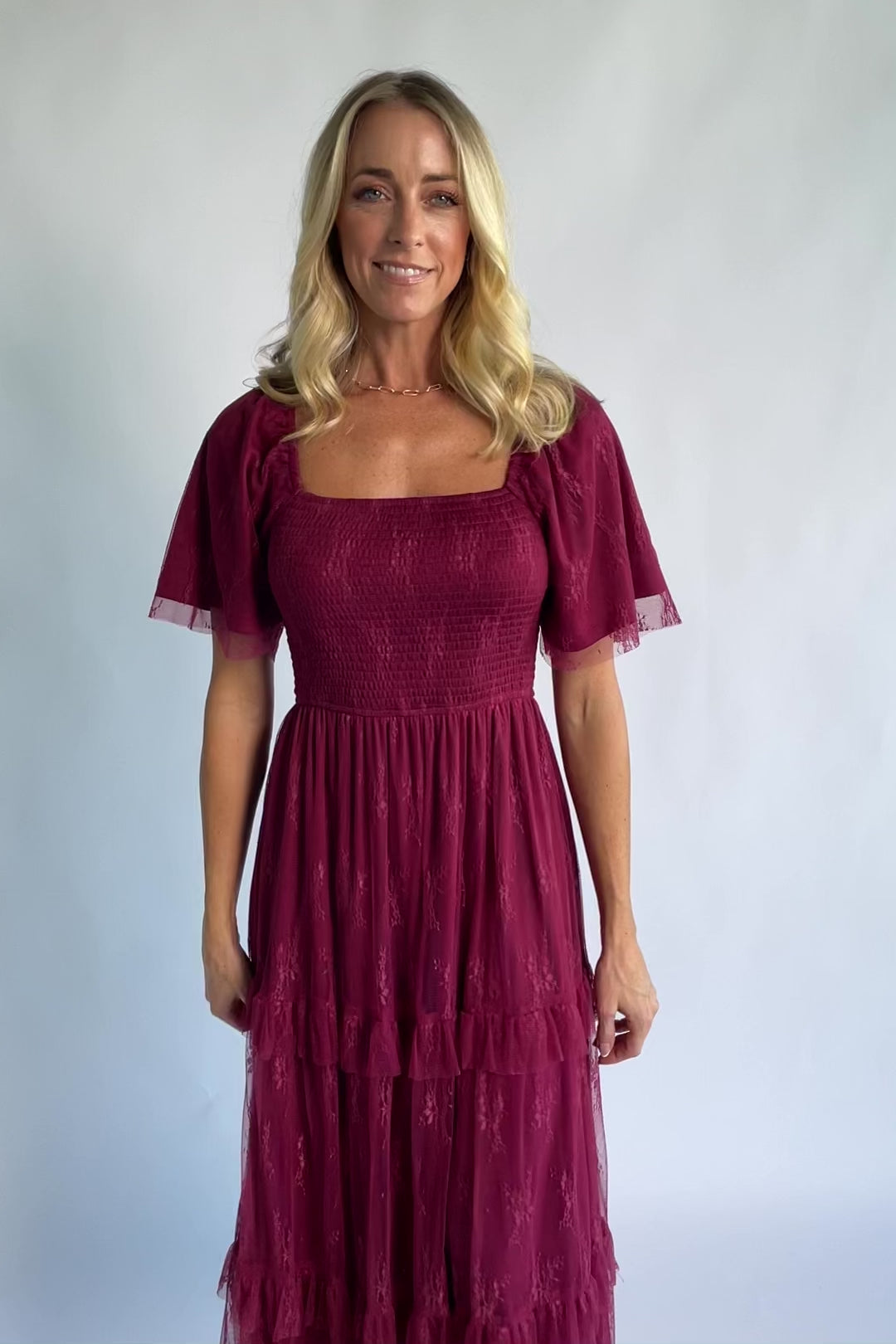Auden Lace Midi Dress in Wine with square neckline, smocked bodice, and ruffle tiered skirt.