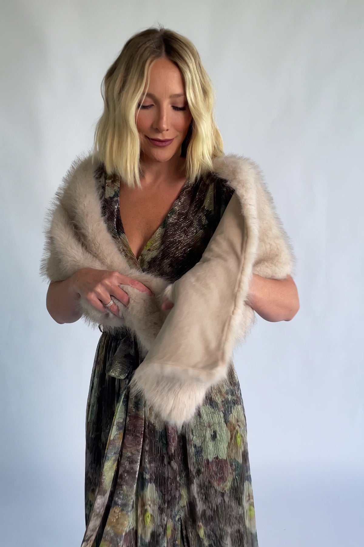 Torino Faux Fur Shawl in Warm Taupe with a soft faux fur finish and an elegant oversized draping silhouette.
