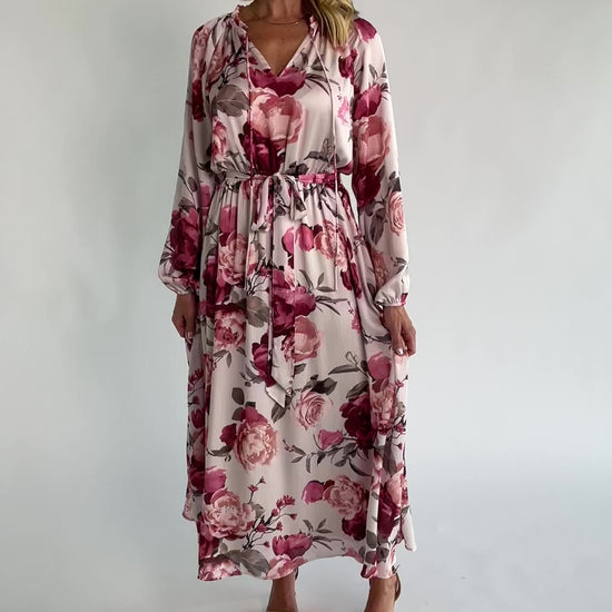Rose floral maxi dress with a split V-neckline, ruffle-trimmed collar, long balloon sleeves, removable self-tie belt, and a flowing maxi skirt.