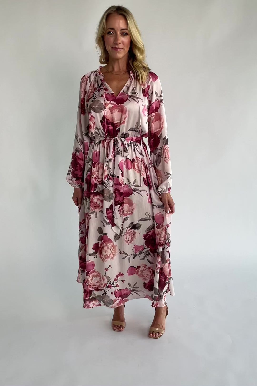 Rose floral maxi dress with a split V-neckline, ruffle-trimmed collar, long balloon sleeves, removable self-tie belt, and a flowing maxi skirt.