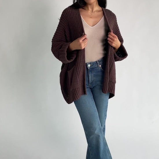Cybele Oversized Cardigan in Dark Brown with soft chenille knit, open front, batwing sleeves, and patch pockets.