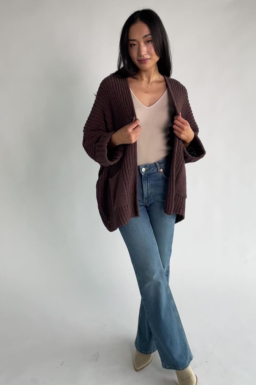 Cybele Oversized Cardigan in Dark Brown with soft chenille knit, open front, batwing sleeves, and patch pockets.