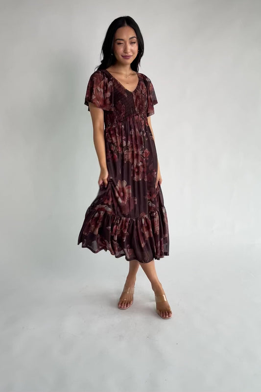 Livia Mesh Midi Dress in Brown + Rust Floral with V-neckline, smocked bodice, flutter sleeves, and tiered hem.