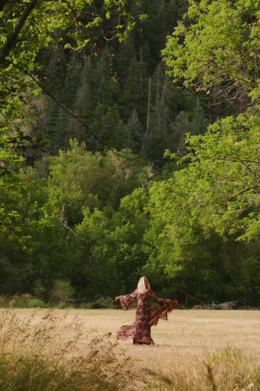 Ashwood Boho Maxi Dress in Brown Floral with square neckline, sheer flared sleeves, smocked back, and tiered skirt.