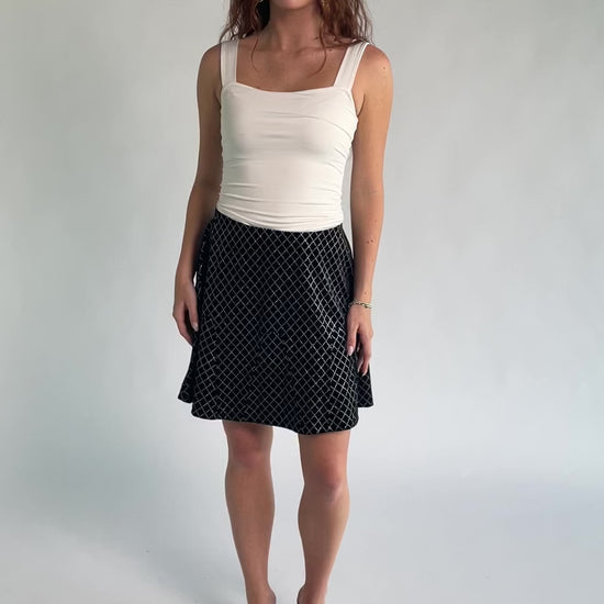 Michelle Flare Skirt in Black with rhinestone embellishments, elastic waistband, and flared silhouette.