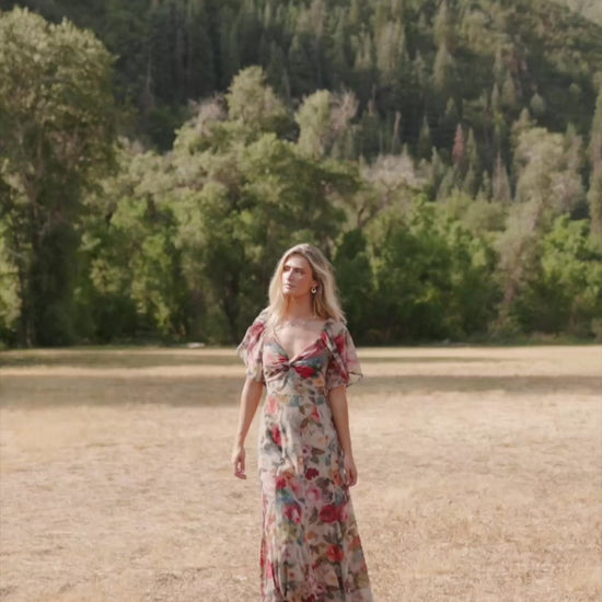 Positano Maxi Dress in Rose Multi Floral with sweetheart knot neckline and flutter sleeves.