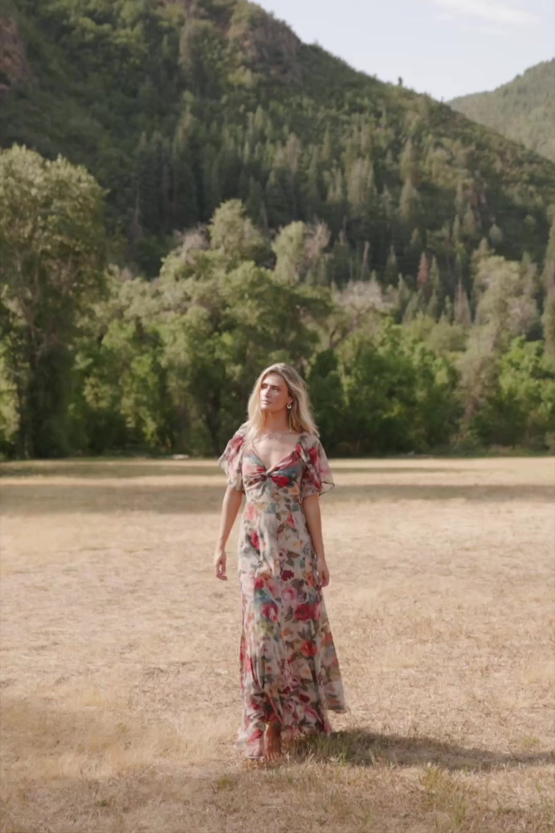 Positano Maxi Dress in Rose Multi Floral with sweetheart knot neckline and flutter sleeves.