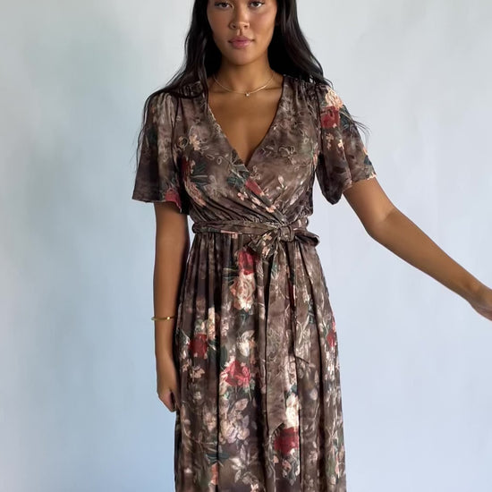 Uma Velvet Maxi Dress in Brown Floral with a burnout mesh overlay, crossover V-neckline, and a side leg slit.