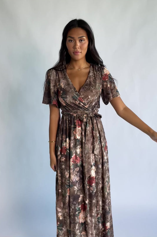 Uma Velvet Maxi Dress in Brown Floral with a burnout mesh overlay, crossover V-neckline, and a side leg slit.