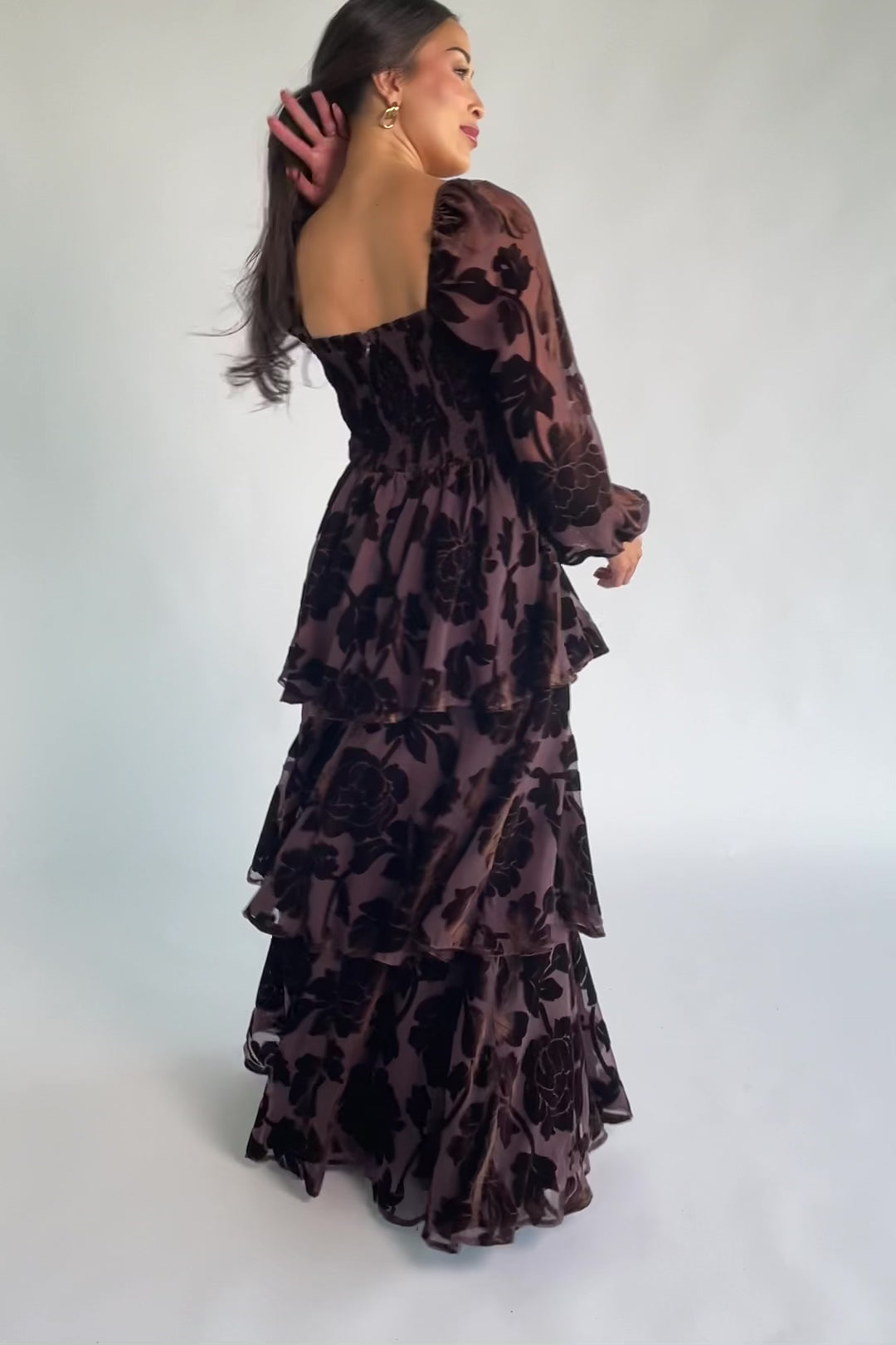Alexandra Velvet Maxi Dress in Dark Brown with velvet florals, sweetheart neckline, long sleeves, smocked back, and flowing skirt.