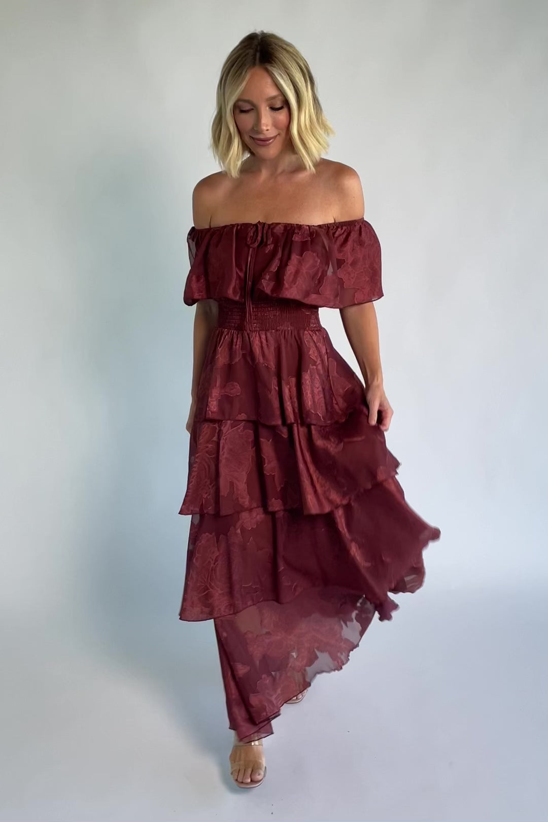Carina Off Shoulder Maxi Dress in Marsala with ruffle neckline, smocked waist, and four-tiered chiffon skirt.
