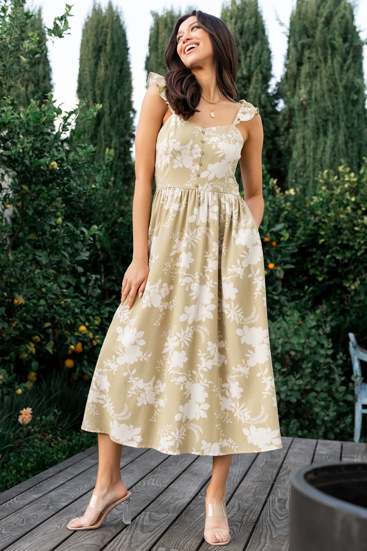 Back view of Renna Button Top Dress showing smocked back panel and fully smocked waist for gentle stretch and comfortable fit.