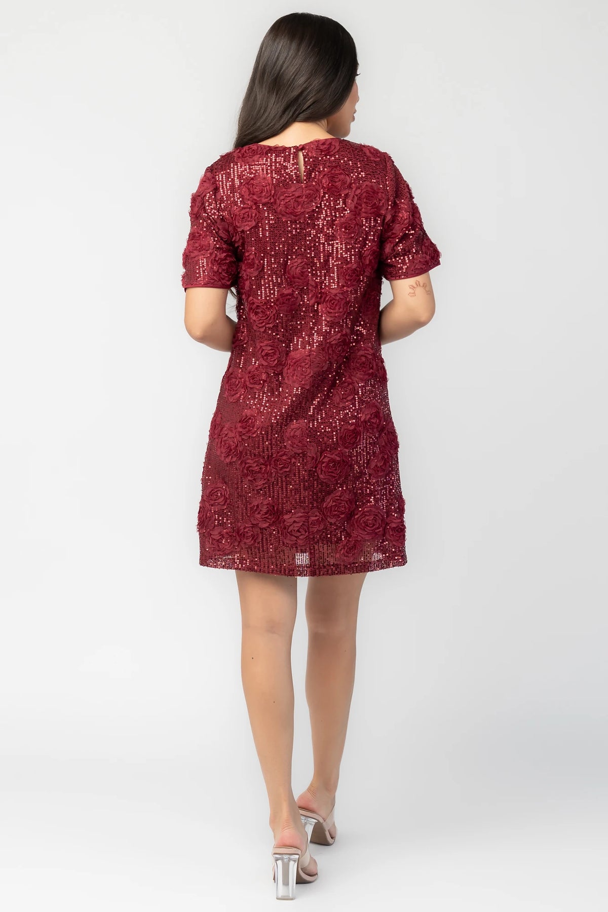 Rhea Sequin Short Dress in Burgundy with sequins, floral appliqué, round neckline, short sleeves, and shift silhouette.