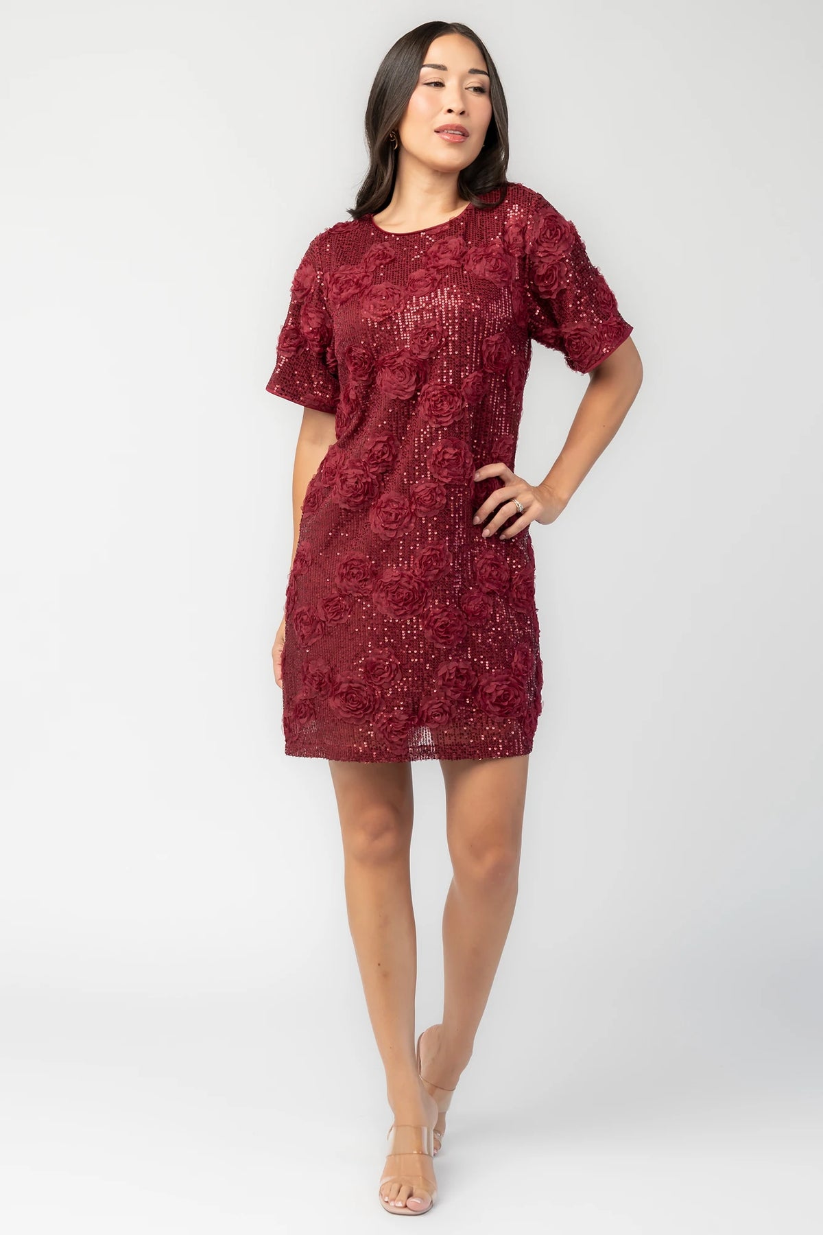 Rhea Sequin Short Dress in Burgundy with sequins, floral appliqué, round neckline, short sleeves, and shift silhouette.