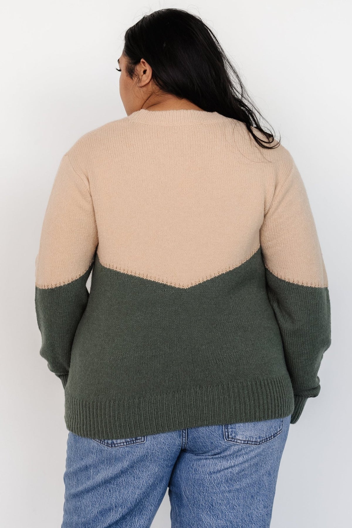 Flat-lay of Rowen Color Block Sweater in natural and green tones, highlighting overall color placement and textured knit surface.