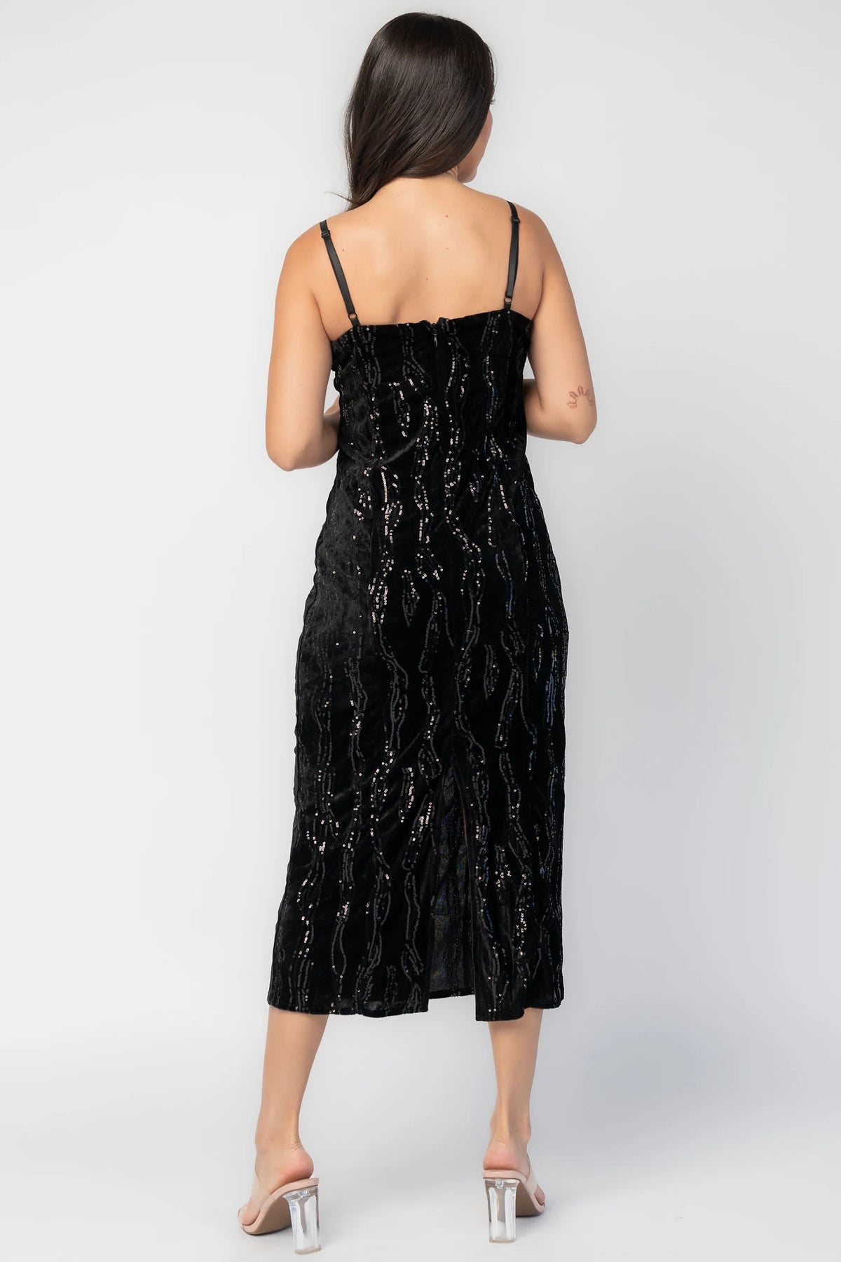 Sabina Sequin Midi Dress in Black with allover sequins, black lace neckline, spaghetti straps, and fitted silhouette.