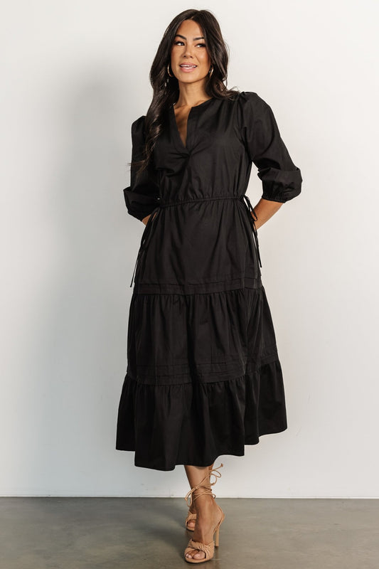 Front view of Santa Fe Poplin Midi Dress in black showing the notched V-neck, self-tie waist and tiered midi skirt in crisp 100% cotton poplin.