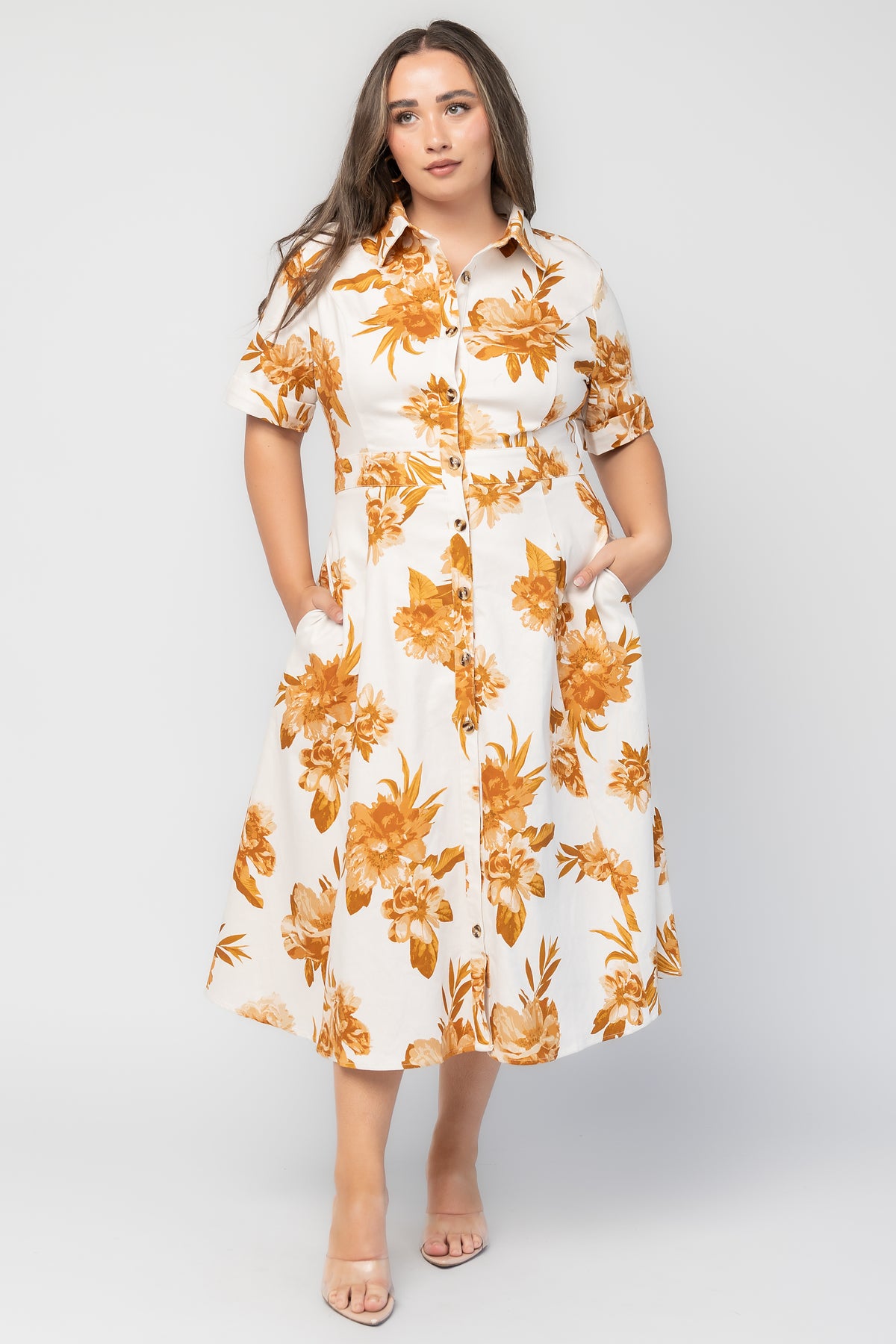 Selena Button Up Dress in Ivory + Golden Floral with collared neckline, button front, short sleeves, and fit-and-flare skirt.