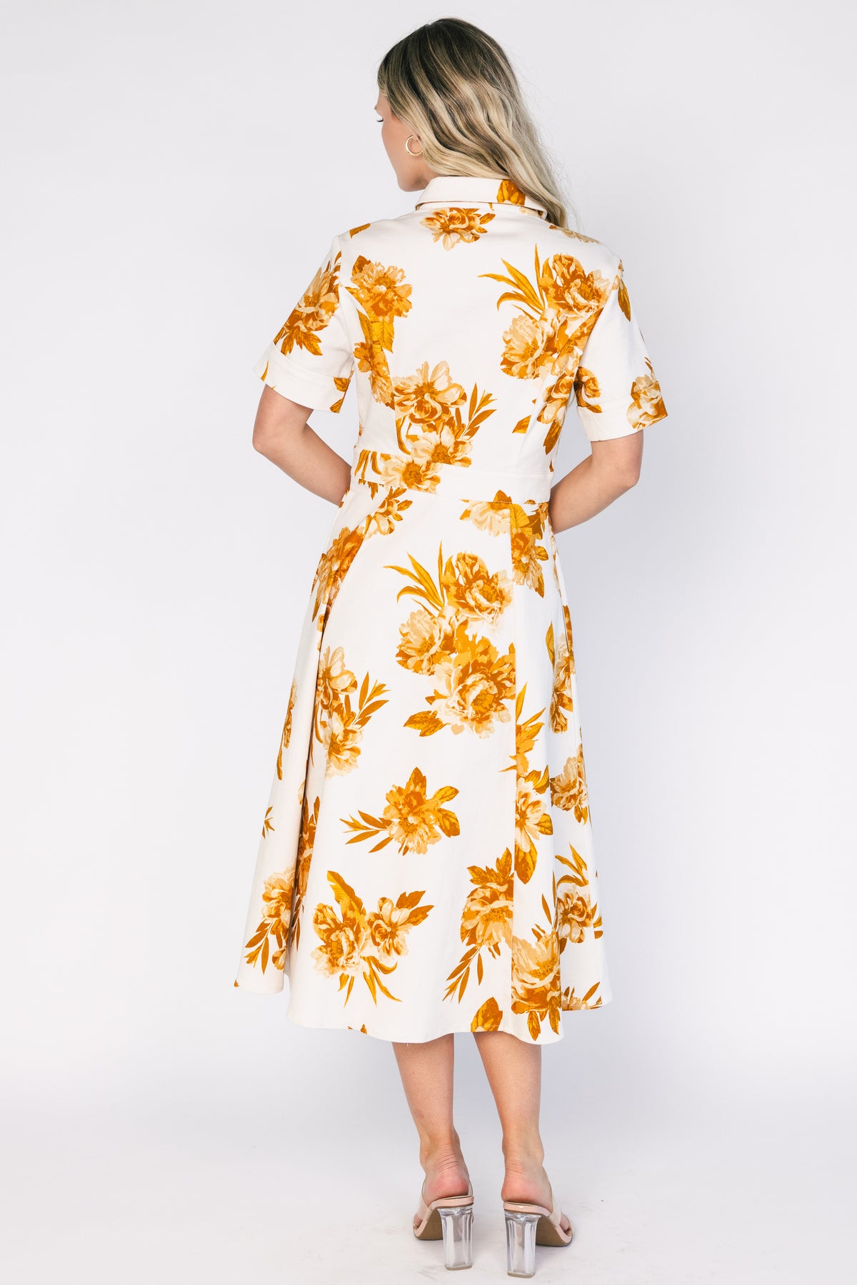 Selena Button Up Dress in Ivory + Golden Floral with collared neckline, button front, short sleeves, and fit-and-flare skirt.