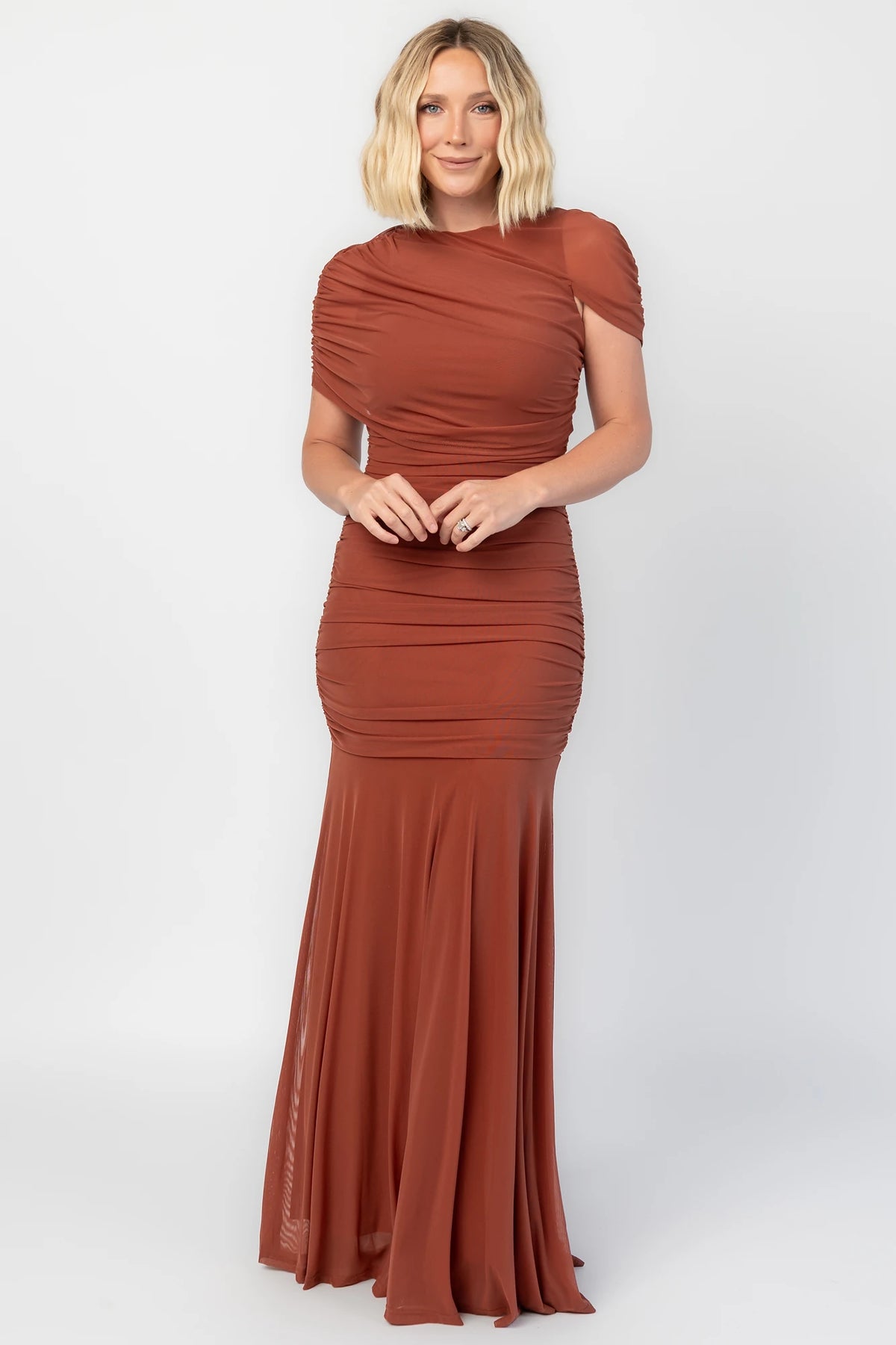 Serenade Maxi Dress in Cinnamon with an asymmetrical neckline, shoulder overlay, and a mermaid hem.