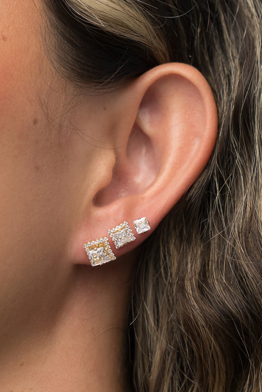 Shaylee Stud Earring Set in Gold with three stud pairs in solitaire and halo designs.