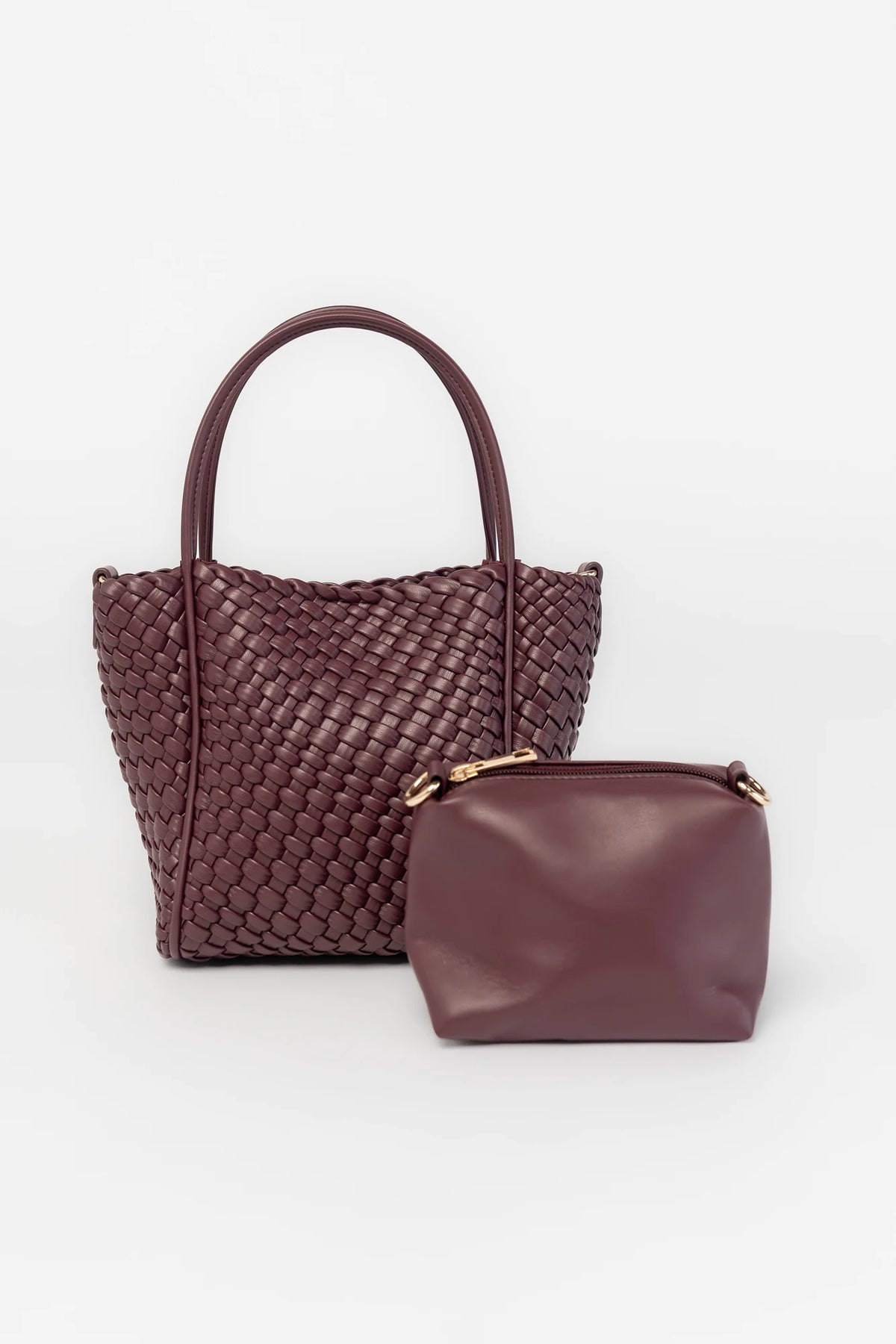 Simone Woven Tote Bag in Wine with removable shoulder straps, matching coin pouch, button closures, and convertible shape.