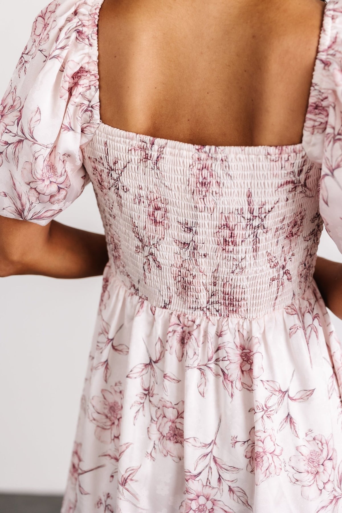 Full-length shot of Sonnet Short Dress on model, emphasizing midi A-line skirt, flattering length and occasion-ready floral print.
