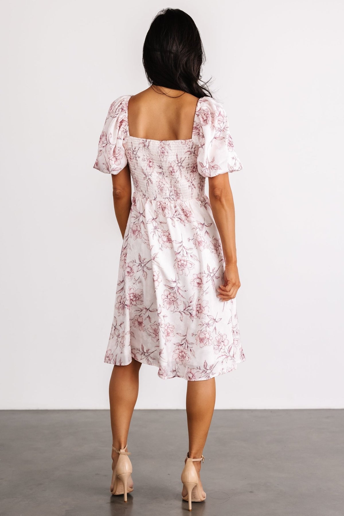 Styled look of Sonnet Short Dress paired with neutral accessories, highlighting versatility for daytime and evening events.