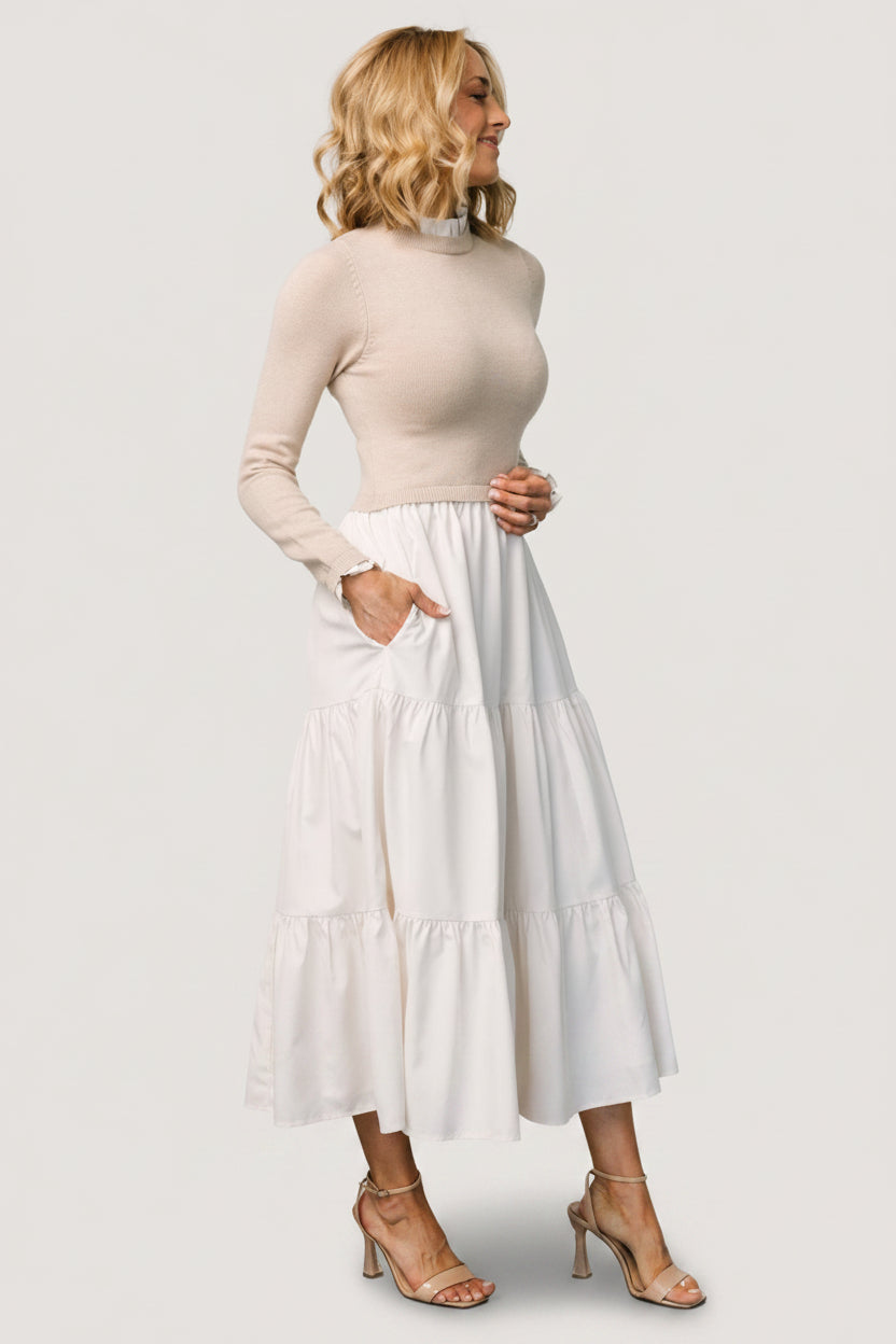 Full-length image of Sophie Sweater Dress in Natural showing flow of three-tier maxi skirt and overall silhouette.