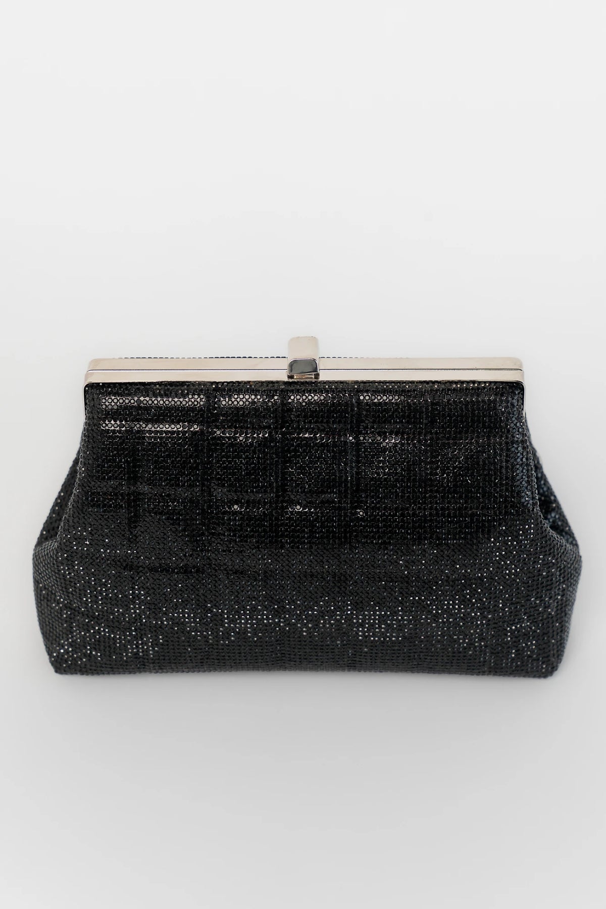 Starlight Evening Clutch Bag with black rhinestones, structured silhouette, clasp closure, and detachable chain strap.