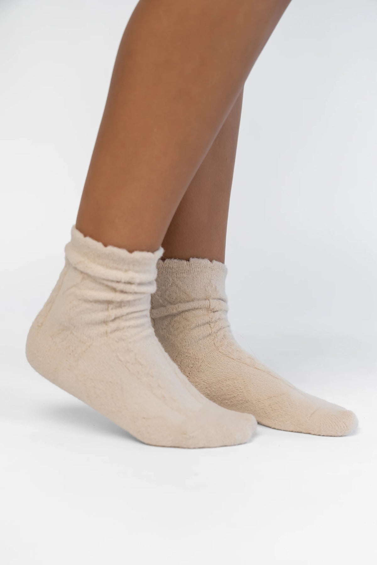 Sterling Cozy Cable Knit Socks in Oatmeal with a soft cable knit design and a ribbed cuff.