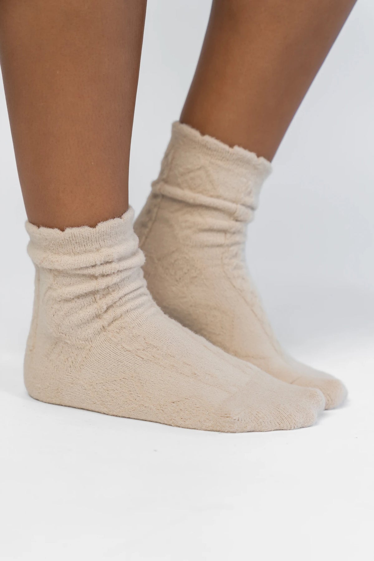 Sterling Cozy Cable Knit Socks in Oatmeal with a soft cable knit design and a ribbed cuff.