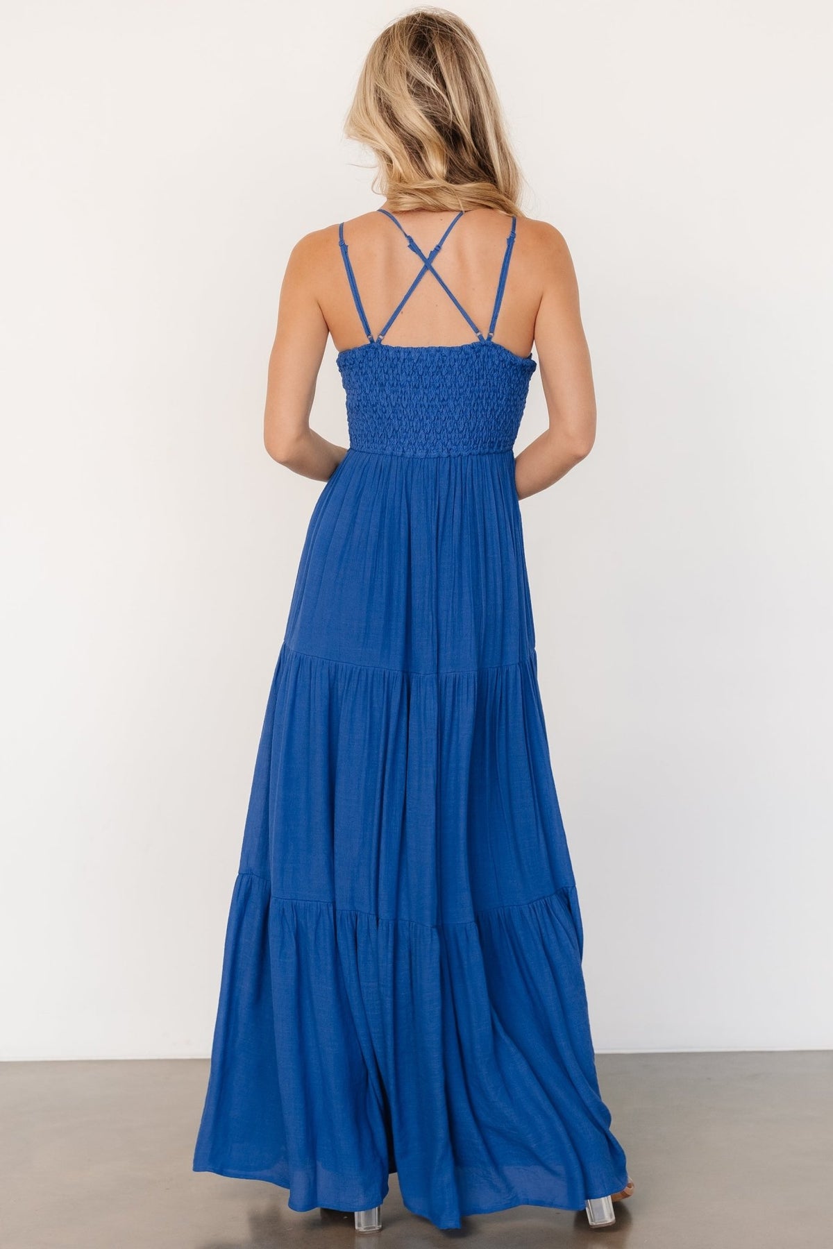Studio flat-lay of blue Summerlin Lace Top Maxi Dress showing full silhouette, lace bodice, and tiered hem detail.