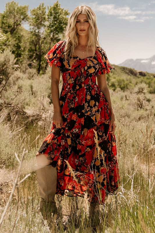Front view of Suzy Maxi Dress in Black + Red Multi showing sweetheart neckline, ruched bust, smocked bodice back, and three-tier chiffon skirt for flow and movement.