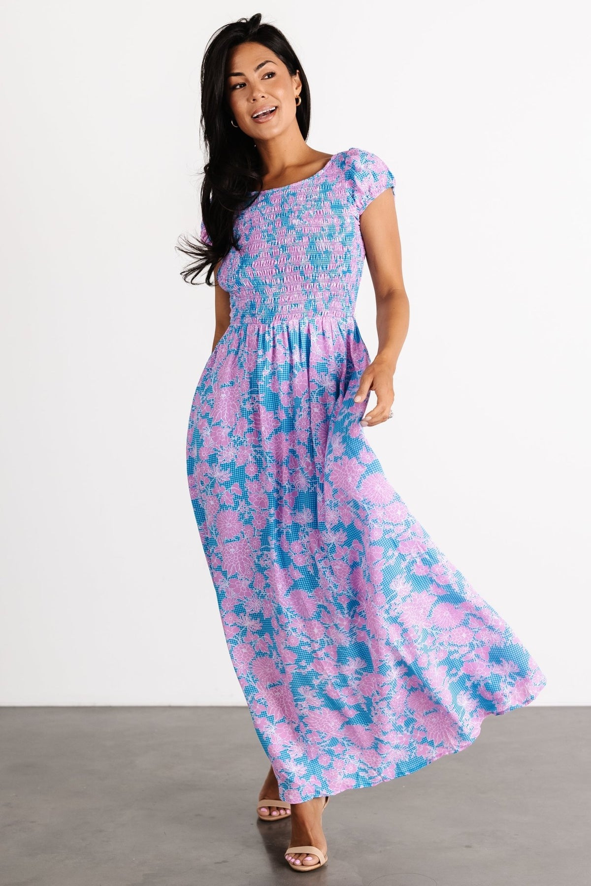Detail shot of the blue gingham and pink floral pattern on the Tabitha Open Back Maxi Dress fabric and print scale.