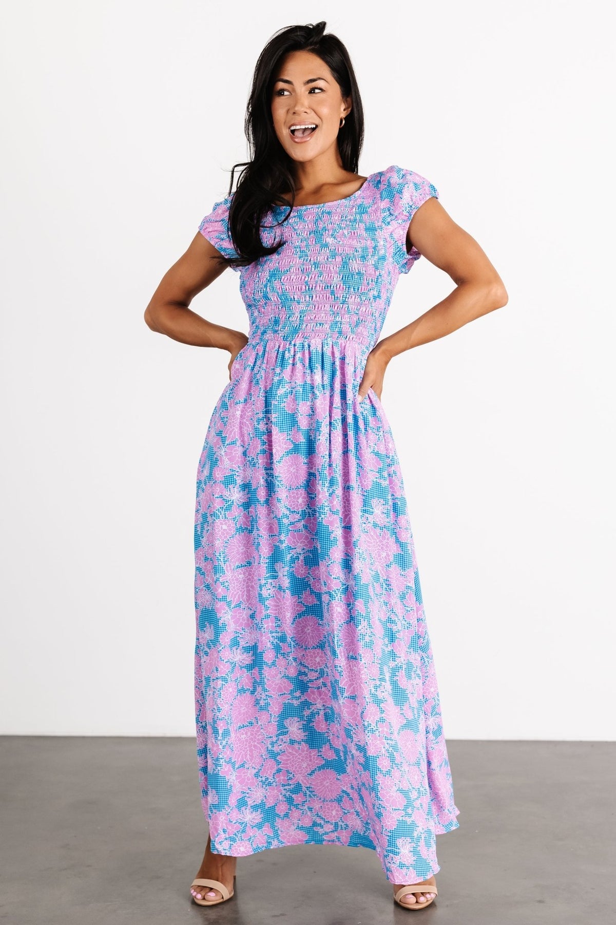 Model wearing the Tabitha Open Back Maxi Dress outdoors, highlighting styling, fit, and the dress's summer-ready silhouette.