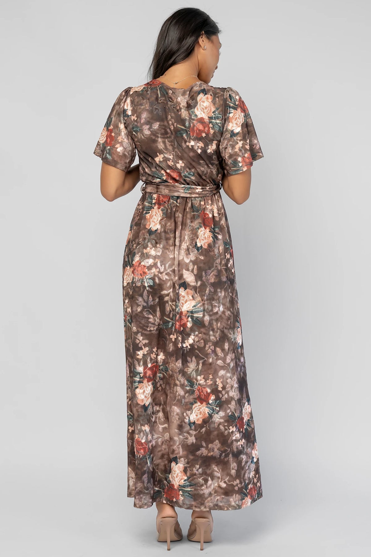 Uma Velvet Maxi Dress in Brown Floral with a burnout mesh overlay, crossover V-neckline, and a side leg slit.